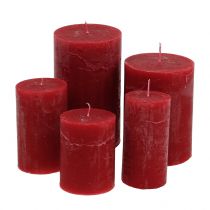 Solid colored candles, dark red, different sizes