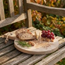 Product Decorative cutting board round mango wood serving board wood Ø26cm