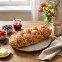 Product Decorative braided yeast bread with sesame seeds, deceptively realistic food replica for display and shop window decoration, 30cm