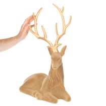 Product Decorative figurine of a reclining deer with antlers, flocked decoration, 58cm