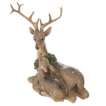 Product Decorative figurine of a deer family with snow as winter decoration, 17cm