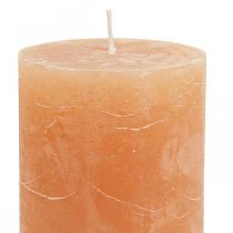 Product Solid-color pillar candles, orange peach, 70x100mm, set of 4. High-quality candle decoration. Long burning time.