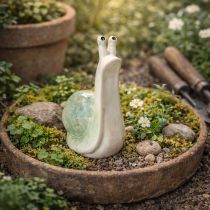 Product Ceramic decorative snail figurine for stylish living environments and enchanting table decorations, 16cm