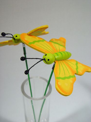 Floristik24 Butterfly on pick green/yellow wood 7cm (24 pcs)