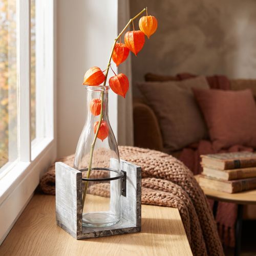 Glass vase in grey wooden