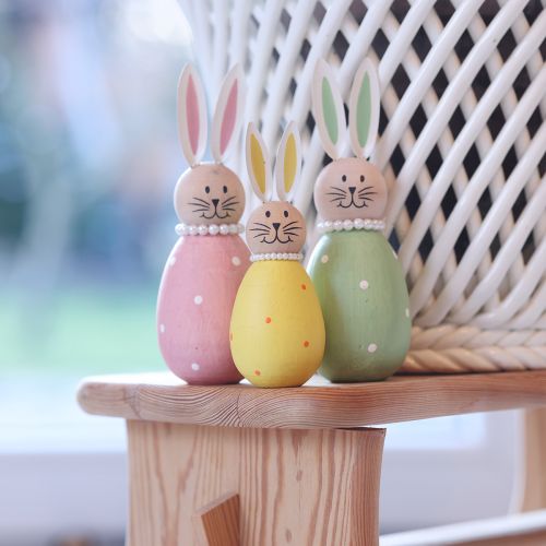 Product Decorative rabbit figurines in an egg design for spring-like home decor, 12cm, 3 pieces