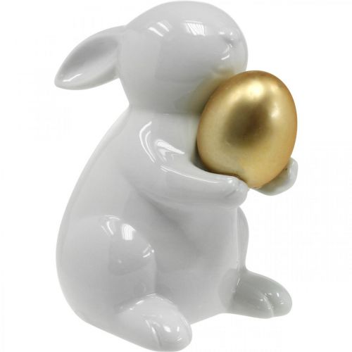 Rabbit with golden egg ceramic, Easter decoration elegant white, golden H15cm