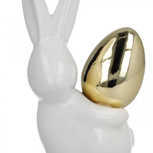 Rabbits with gold egg, ceramic rabbits for Easter noble white, golden H13cm 2pcs