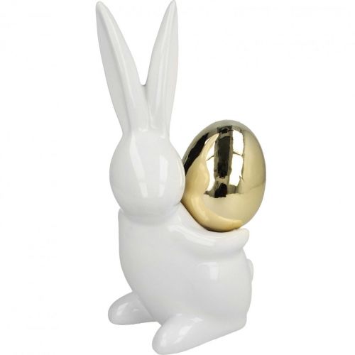 Product Easter bunnies elegant, ceramic bunnies with gold egg, Easter decoration white, golden H18cm 2pcs
