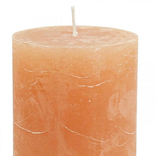 Product Solid-color pillar candles, orange peach, 70x100mm, set of 4. High-quality candle decoration. Long burning time.