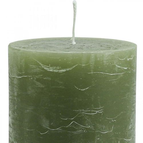 Product Olive green pillar candles 85×150mm 2 pieces – Solid-colored, marbled wax candles with an 80-hour burning time