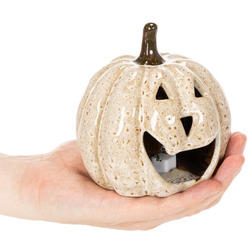 Ceramic pumpkin decoration with LED and grinning face, 13cm | Floristik24.ie