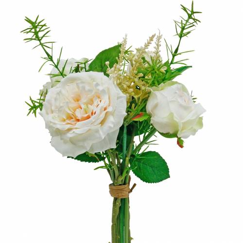 Bouquet of artificial roses. Cream silk flowers in a bouquet