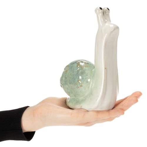 Product Ceramic decorative snail figurine for stylish living environments and enchanting table decorations, 16cm