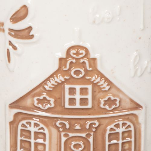 Ceramic mug with house motif
