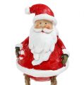 Floristik24 Decorative figure Santa Claus sitting 6.5cm L10cm 4pcs
