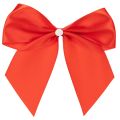 Decorative red bow, pre-tied