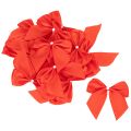 Decorative red bow, pre-tied