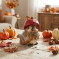 Decorative bird figurine with red apple cap, autumn decoration, 13cm | Floristik24.ie