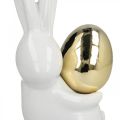 Floristik24 Easter bunnies elegant, ceramic bunnies with gold egg, Easter decoration white, golden H18cm 2pcs