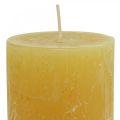Floristik24 Pillar candles Rustic solid colored candles yellow 70/140mm 4pcs