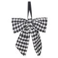Fabric bow with brooch and