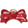 Red bow-shaped candle holders